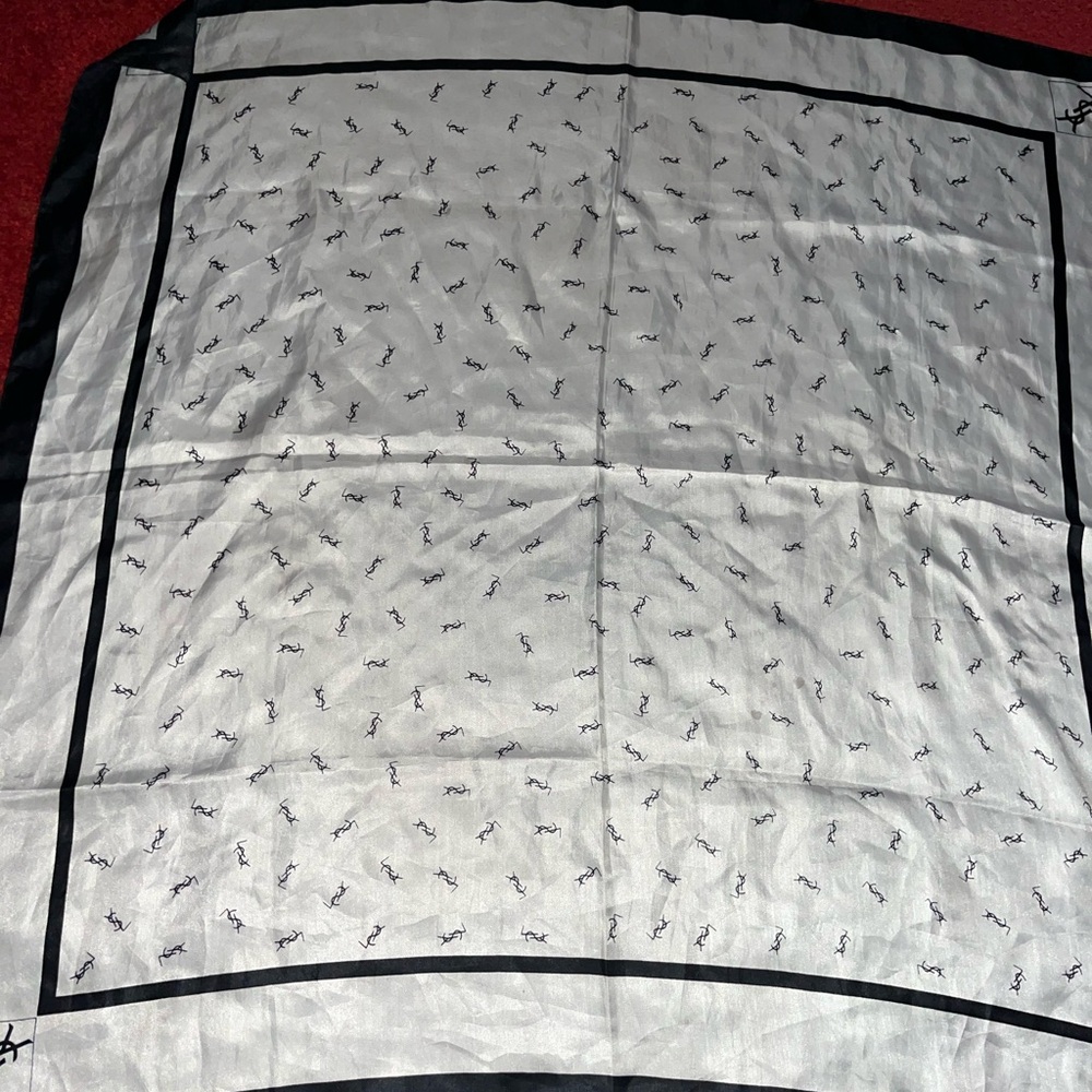 Brand new never used Vintage 1980’s Yves Saint Laurent Silk square.